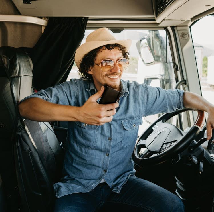 man on phone in truck